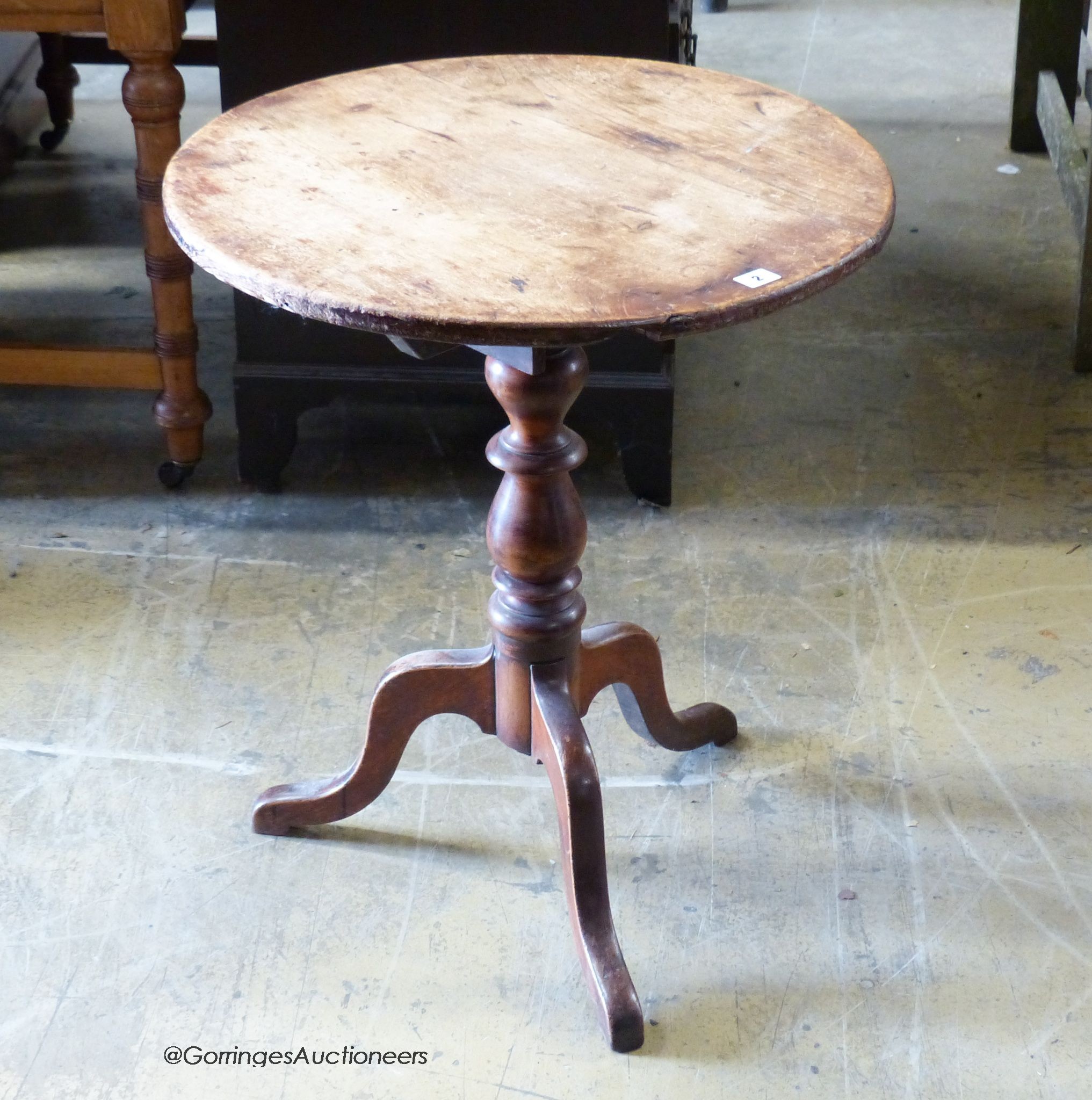 A Victorian mahogany circular tripod wine table, 61cm diameter, height 70cm